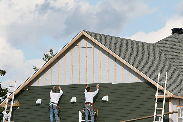 Professional Emergency Siding Repair technician working in Glencoe, FL